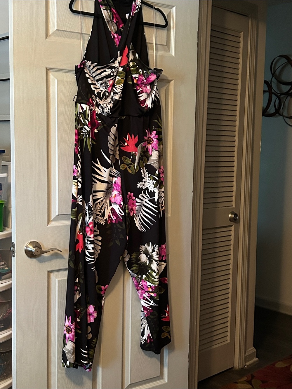 Shelby & Palmer Black Criss Cross front Floral Jumpsuit with Pink Accents
